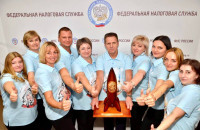 василий Анохин поздравил с Днем работника налоговых органов Российской Федерации - фото - 1